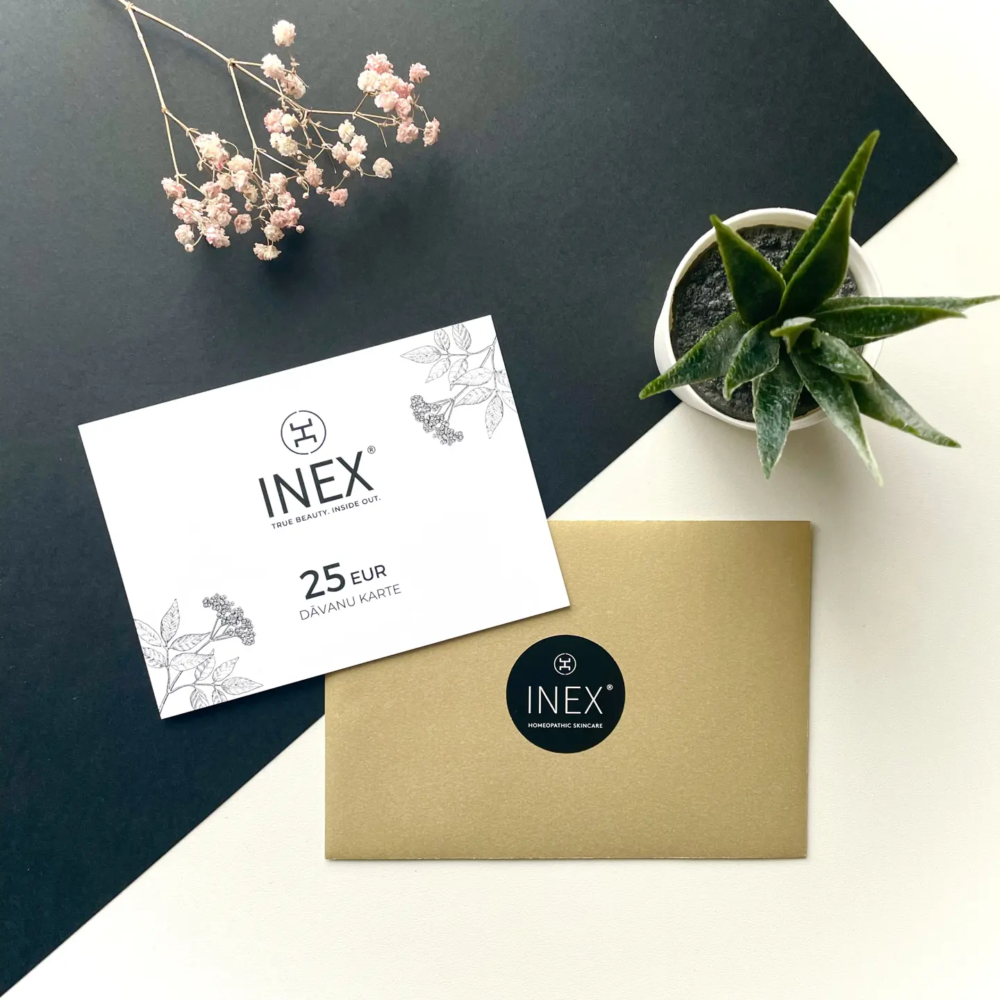 INEX dāvanu kartes kompozīcija
